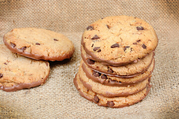 Grouo of chocolate cookies on a jute canvas