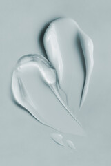 Cream gel gray transparent cosmetic sample texture with bubbles gray background