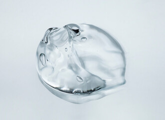 Cream gel gray transparent cosmetic sample texture with bubbles gray background