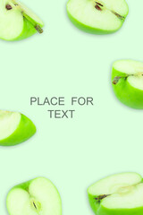 Creative layout with green apples on a light background. Food concept. Copy spaсe
