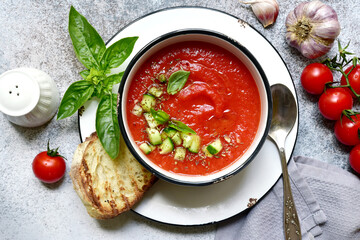 Gazpacho - traditional spanish cold tomato soup. Top view with copy space.