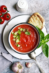Gazpacho - traditional spanish cold tomato soup. Top view with copy space.