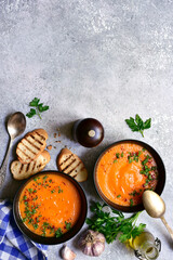 Vegetable soup with carrot and pumpkin. Top view with copy space.