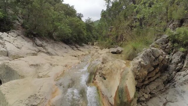 drone view of the Borosa riverbed and natural pools. Located in the Natural Park of the Sierras de Cazorla, Segura y las Villas, Spain.