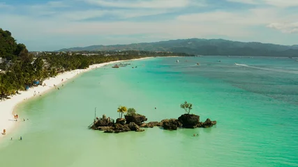 Papier Peint photo Plage blanche de Boracay Topical white beach and Willy's rock with tourists and hotels and sailing boat on Boracay Island. Aerial drone: Tropical white beach with sailing boat. Summer and travel vacation concept.