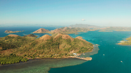 aerial view seascape bay with islands and mountains in province of Palawan. Busuanga, Philippines. Seascape, islands covered with forest, sea with blue water. tropical landscape, travel concept