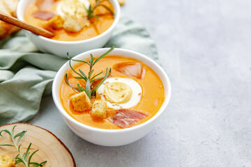 Vegan healthy food. Tomato soup or gazpacho on light  background. Copy space.