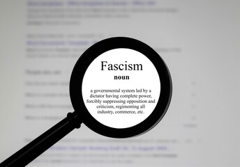 Fascism word in a dictionary. Close up of an English dictionary page with the word Fascism. - obrazy, fototapety, plakaty