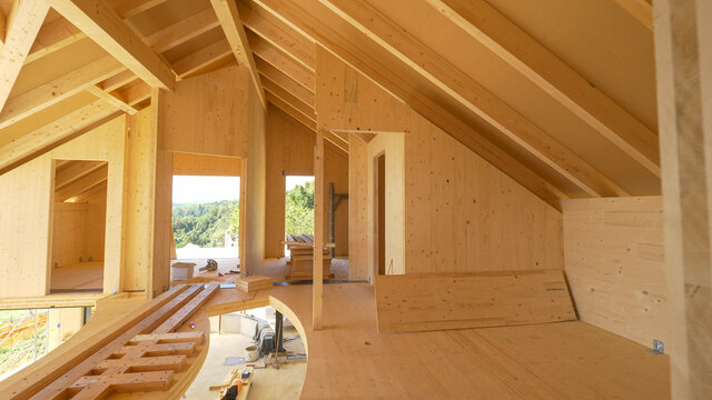 CLOSE UP: View of beautiful unfinished interior of a prefabricated lumber house.