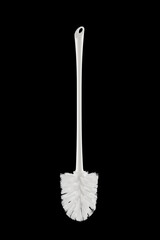 white plastic toilet brush, isolate on black background