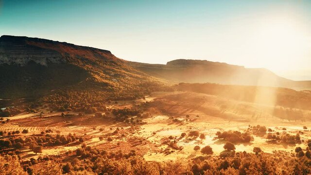 Time lapse. Morning light over mountain and valley with restored grounds of Sad Hill Cemetery, the fictional round graveyard where the final duel of western The Good, The Bad and the Ugly takes place.