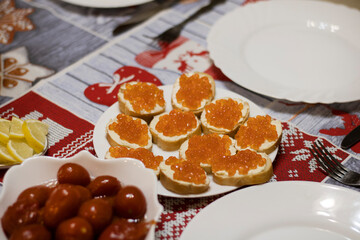 Red caviar fish on the holiday table.