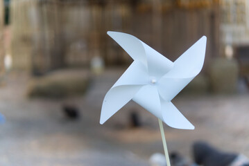 toy white turbine wind background © akachai studio