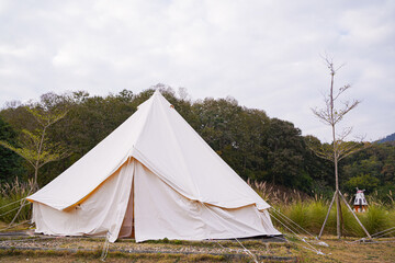 Tourist camping tent in a mountains