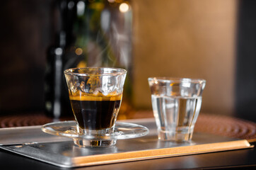 A cup of hot coffee in coffee shop.