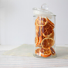 dried fruit in a jar and on the table. vegetarianism and healthy eating. energy for all time from healthy food. beautiful fruits in jars. weight loss. orange white glass. High quality photo