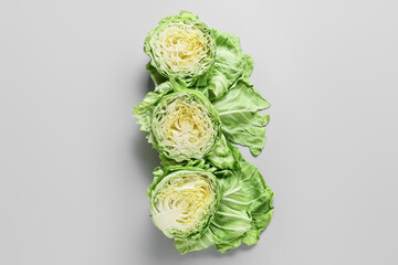 Fresh cabbages on light background