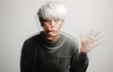 Conceptual Motion Blurred Photo of Crazy Person. Bipolar Disorder. Mental Health and Psychology...