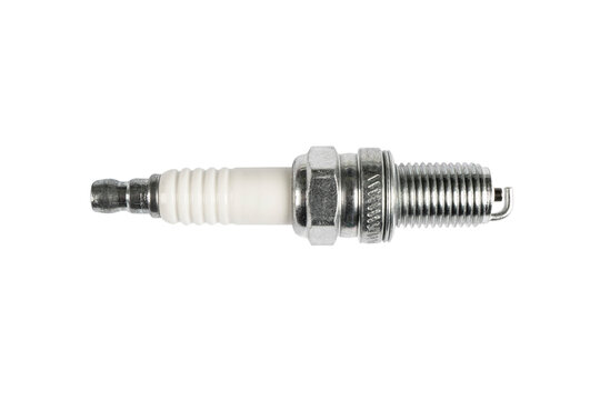 Macro shot of spark plug isolated on white background. A spark plug for an engine isolated with clipping path. Quality spare parts for car service or maintenance