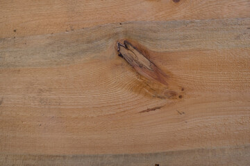 Wooden background. Pine board with a defect. Copy space. 