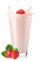 strawberry falling in glass of milkshake with splash