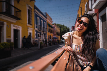 Obraz premium portrait of happy latina smiling at camera