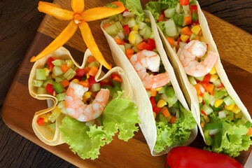 Burritos wraps with minced shrimp and vegetables.