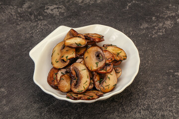 Roasted champignon with herbs and spices