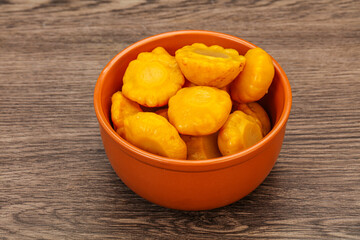 Marinated yellow patisson in the bowl