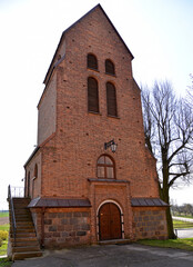 Photographs of the belfry of the Catholic Church of Saint Achatius in Czernice Borowe in Masovia, Poland.