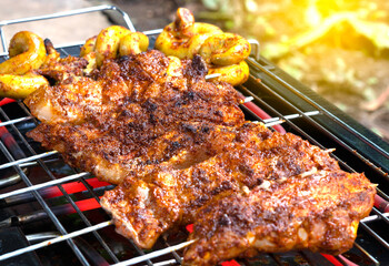 Grilled pork steak. Roast pork while grilling