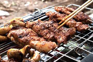Grilled pork steak. Roast pork while grilling