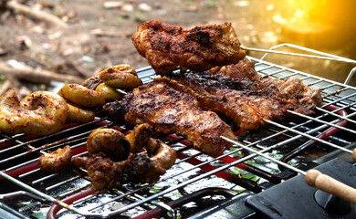 Grilled pork steak. Roast pork while grilling