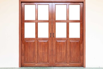 Large teak wood door frame isolated on a white background