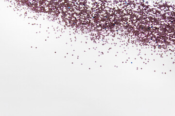 Glamour romantic background with shiny pink glitter particles on top