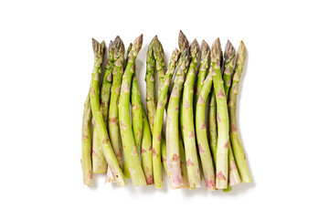 Fresh asparagus for salad or smoothies, healthy food for vegans and raw foodists. isolated on white background, top view