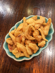 Crispy pork lard on dish; delicious for noodle side dish or snack.