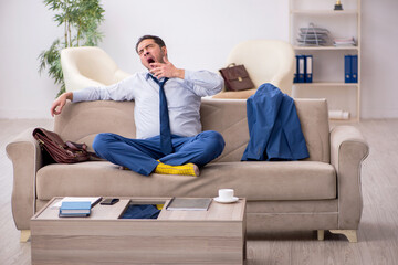 Fototapeta premium Young businessman employee waiting for business meeting