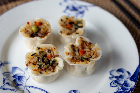 Chinese authentic traditional dish: Cantonese style shumai with rice and pork beef, closeup 