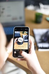 person taking pictures of coffee with a smartphone
