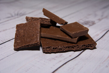 pieces of chocolate, chocolate, sweet, food, dessert, brown, dark, isolated, candy, bar, white, cocoa, milk, delicious, snack, broken