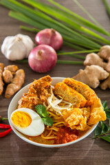 Curry Laksa which is a popular traditional hot and spicy noodle soup from the culture in Malaysia.