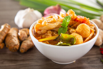 Tom yam kong or Tom yam is a spicy clear soup typical in Thailand and No.1 Thai Dish Cuisine. Thai food.