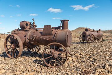 Fototapeta na wymiar Old rusty mining machinery obsolete industrial equipment at abandoned silver mine near Broken Hill, Australia