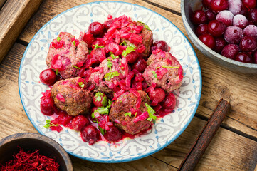 Lamb meatballs in cherry sauce