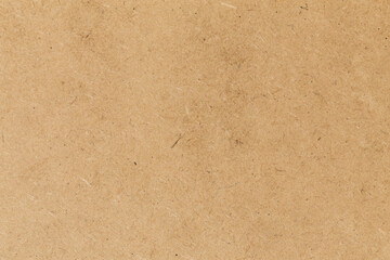 Pressed beige chipboard texture.
