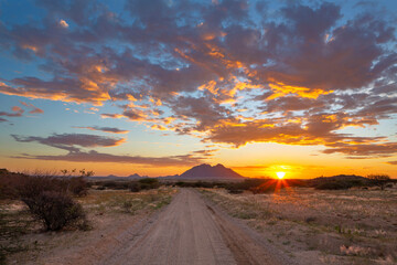 Sunset coloring the clouds at Spitzkoppe