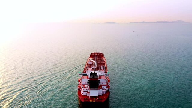 4k. Aerial view cargo ship of business logistic sea freight, Crude oil tanker lpg ngv at industrial estate Thailand  Group Oil tanker ship to Port of Singapore - import export 