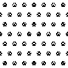 seamless pattern footprints of dog. Black animal tracks. Vector texture for textiles and wallpaper.