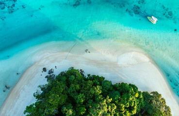 The Tropical island beach which  green lush tropical island in a blue and turquoise sea with...